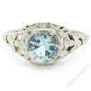 Image 1 : Antique Art Deco 18kt White Gold Round Aquamarine Solitaire Floral Filigree Ring
