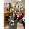Image 1 : GARBAGE BIN OF HOCKEY STICKS, WALKING STICK, LAWN CHAIR, & MORE