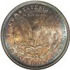 Image 2 : 1881 S$1 MS66 NGC. Deep crescents of cobalt-blue, ambe