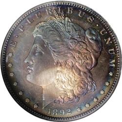 1892 S$1 PR66 S NGC. Dramatic rose-red, gold, and oce