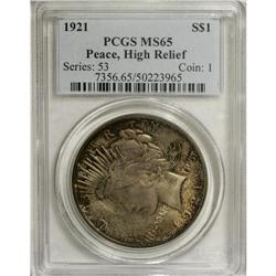 1921 S$1 MS65 PCGS. This softly lustrous Gem has the d