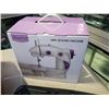 Image 2 : New mini sewing machine with box of new electronics