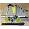 Image 1 : RYOBI TABLE SAW SET WITH STAND AND A BLADE.