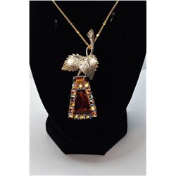 7)  VINTAGE GOLD TONE WITH AMBER CRYSTAL