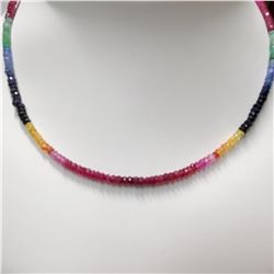 SINGLE STRAND OF EMERALD, RUBY & SAPPHIRES
