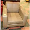 Image 1 : TAN LEATHERETTE CHAIR. NEEDS CLEANING. 35" WIDE