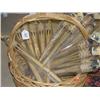 Image 1 : Large basket with seventeen tiki torche