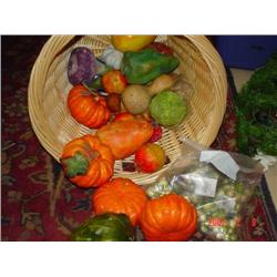 Basket filed with decorative fruit