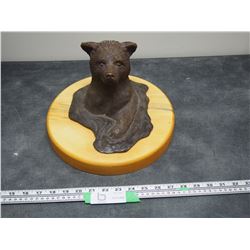 METAL BEAR ORNAMENT MOUNTED ON WOOD (SIGNED ON THE BOTTOM)
