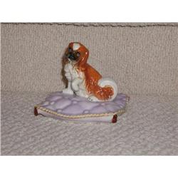 Porcelain Spaniel Dog on Ornate Cushion #1424446