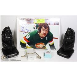 UNCLAIMED BOX WITH BOOKENDS, JEWELRY, ETC.