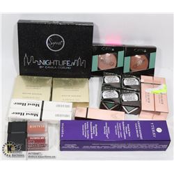 UNCLAIMED BOX OF MAKEUP AND MORE....