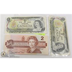 UNCLAIMED LOT OF 3 CANADIAN $1 AND $2 BILLS
