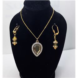 15)  GOLD TONE AND OLIVE GREEN PERIDOT CZ