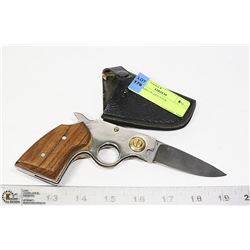 GUN KNIFE IN HOLSTER