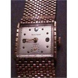 Bulova wrist watch/attached band #1402705