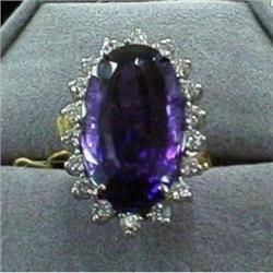 Ring: 14 kt gold amethyst ring with diamonds. #1402709