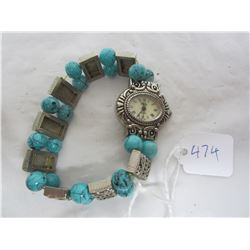 Vintage turquoise and silver colored watch needs battery