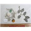 Image 1 : Lot of 2 charm bracelets the one on left is sterling most charms are marked one on right is not ster