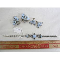 Matching set of costume jewelry with blue stones bracelet and 2 sets of earrings