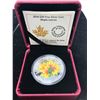 Image 1 : 2014 Colourized Maple Leaves $20. A beautiful colourized sugar maple leaf coin by artist Celia Godki