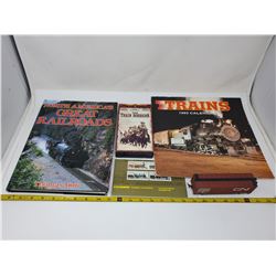 Train lot - railroad book, locomotive stamps, train robbers VHS and more