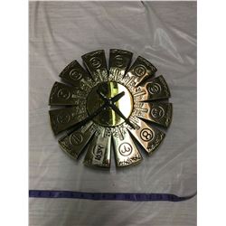 heavy brass clock battery needed 17 inch across