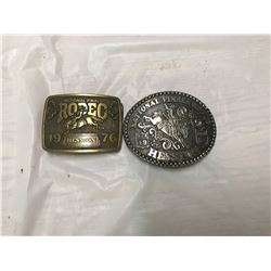 (2) belt buckles Hesston 1976 + 1984
