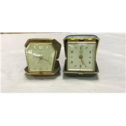 2 travel alarm clocks