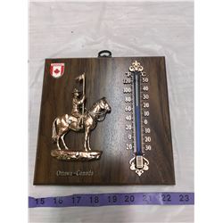 RCMP thermometer 8"x8"