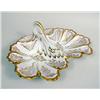 Image 1 : A PORCELAIN PARCEL GILT DECORATED LEAF FORM HANDLED SERVING DISH