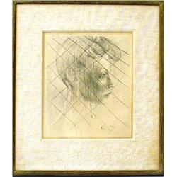 A FRAMED PRINT OF A WOMAN`S FACE IN PROFILE