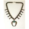 Image 1 : AN OLD NAVAJO HAND WROUGHT SILVER AND TURQUOISE SQUASH BLOSSOM NECKLACE