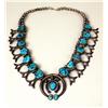 Image 1 : AN OLD NAVAJO HAND WROUGHT SILVER AND TURQUOISE SQUASH BLOSSOM NECKLACE