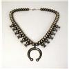 Image 1 : AN OLD NAVAJO HAND WROUGHT SILVER SQUASH BLOSSOM NECKLACE