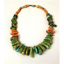 AN OLD NAVAJO HAND CUT AND POLISHED TURQUOISE AND CORAL SLAB NUGGET NECKLACE