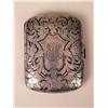 Image 1 : AN ELABORATELY ENGRAVED STERLING SILVER CIGARETTE CASE