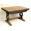 Image 1 : A JACOBEAN STYLE OAK DRAW LEAF TRESTLE BASE TABLE