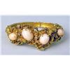 Image 1 : A YELLOW GOLD CORAL AND DIAMOND HINGED BANGLE BRACELET
