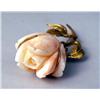 Image 2 : AN 18K YELLOW GOLD AND CARVED CORAL FLORA-FORM BROOCH