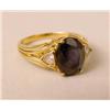 Image 1 : A 14K YELLOW GOLD DIAMOND AND IOLITE RING