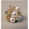 Image 1 : A 14K YELLOW GOLD DIAMOND AND PEARL RING