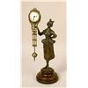 Image 1 : A BRONZE PATINATED METAL FIGURAL SWINGER CLOCK