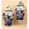 Image 1 : A PAIR OF BLUE AND WHITE FLORAL DECORATED PORCELAIN COVERED JARS