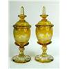 Image 1 : A PAIR OF ETCHED BOHEMIAN AMBER GLASS COVERED URNS