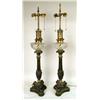 Image 1 : A PAIR OF CAST IRON AND GLASS OIL LAMPS