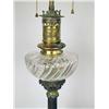 Image 2 : A PAIR OF CAST IRON AND GLASS OIL LAMPS