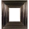 Image 1 : A BAROQUE EBONIZED FRAMED LOOKING GLASS