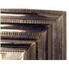 Image 2 : A BAROQUE EBONIZED FRAMED LOOKING GLASS