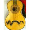 Image 2 : A SMALL CARVED AND SHELL INLAID GUITAR